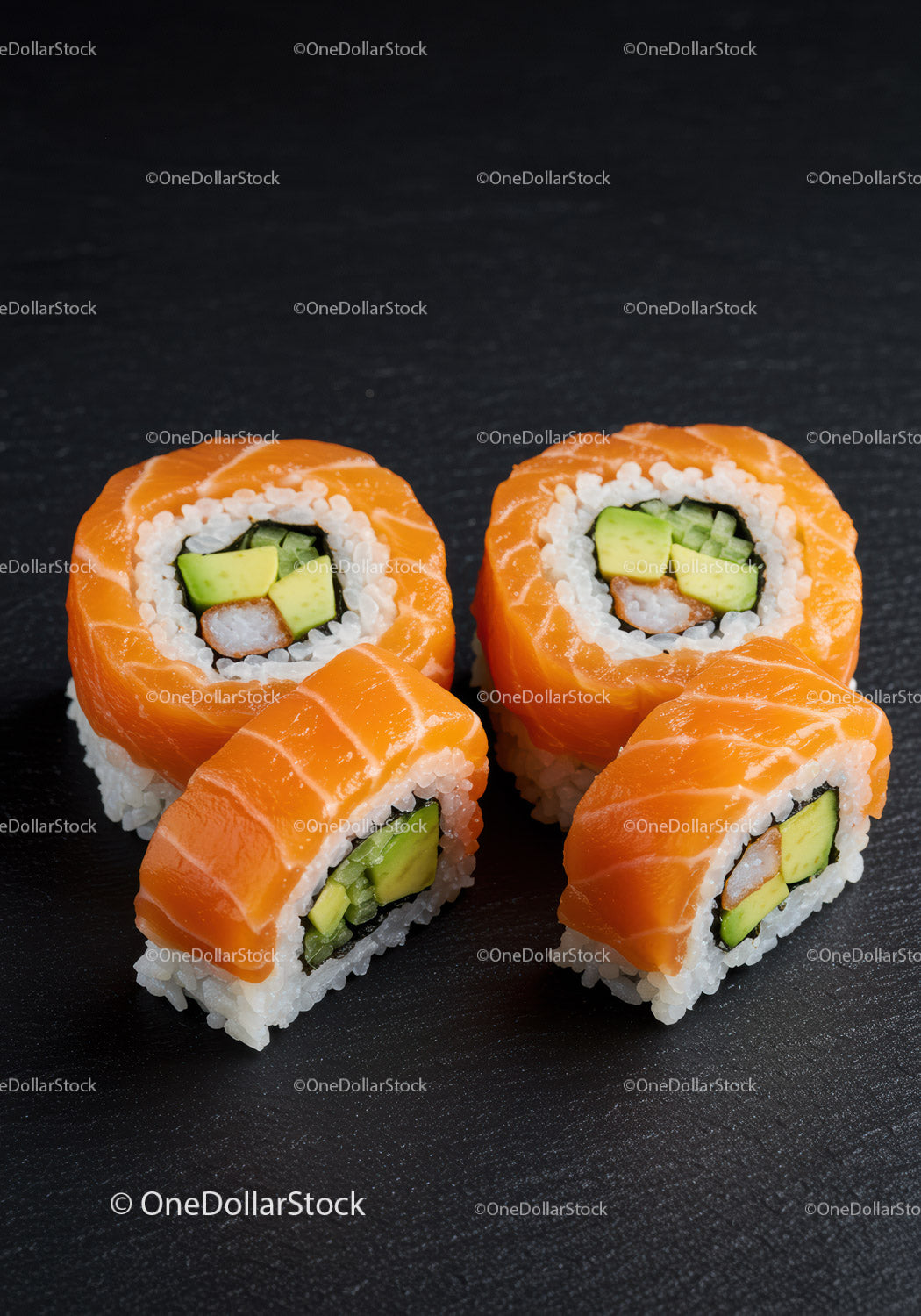 Fresh salmon sushi rolls with avocado and cucumber