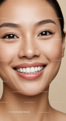 Close-up of Smiling Young Woman with Smooth Skin