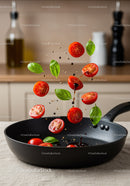 Fresh tomatoes and basil leaves tossed in black skillet