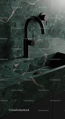 Elegant Black Kitchen Faucet with Green Marble Countertop and Sink