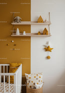Modern Kid's Nursery with Yellow and White Wall Decor and Plush Toys