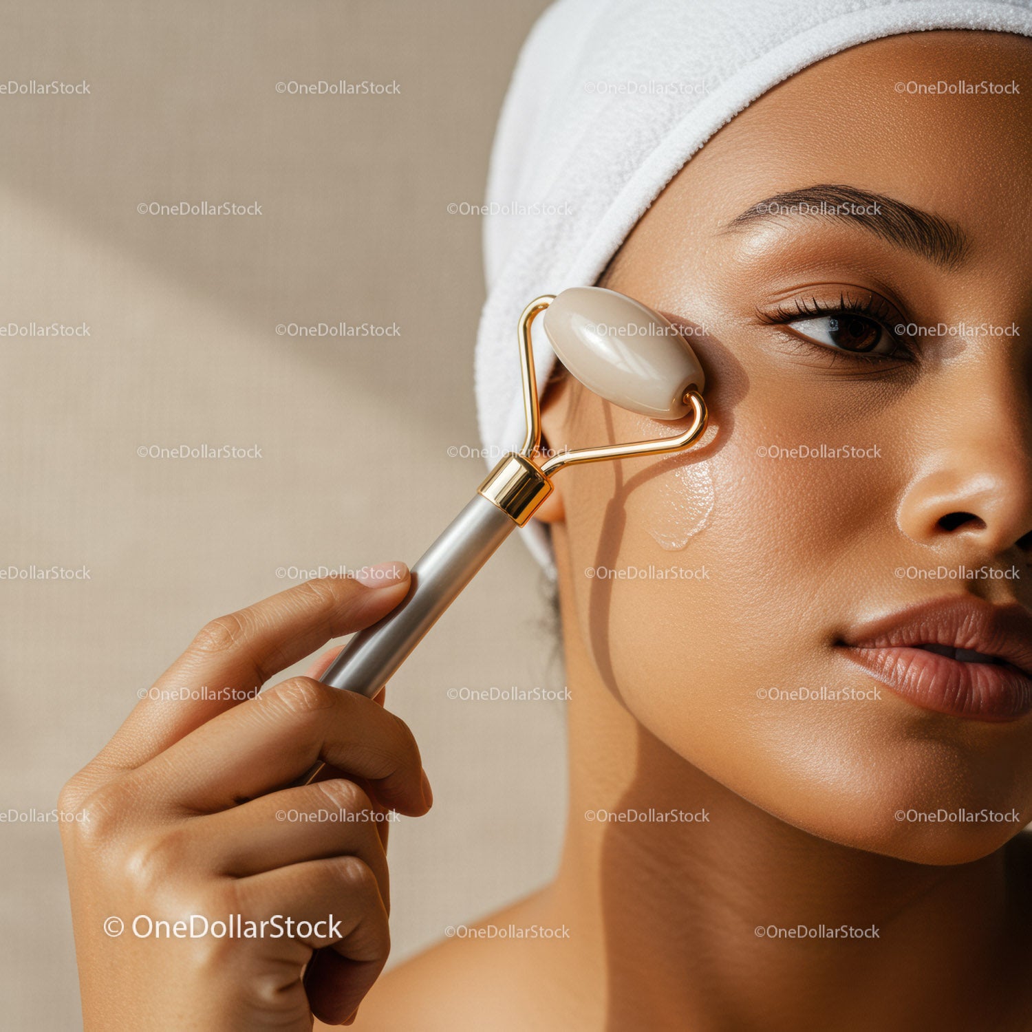 Young Woman Receiving Facial Massage with Beauty Roller
