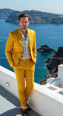 Man in Yellow Suit Standing by Seaside Cliff Viewpoint