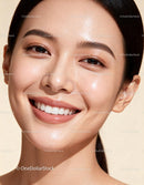 Close up of smiling woman with radiant healthy skin