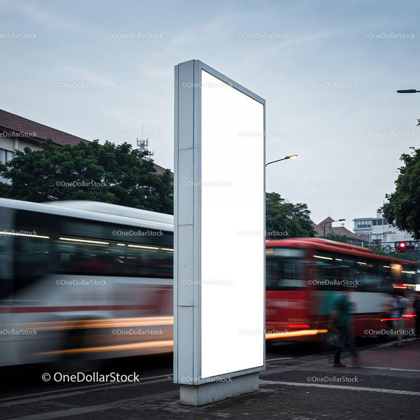 Blank vertical billboard on city street with moving buses JPG Mockup Image