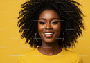 Vibrant Portrait of a Smiling Woman with Curly Hair in Yellow