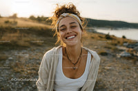 Smiling Woman in Casual Summer Outfit on Beach with Ocean View