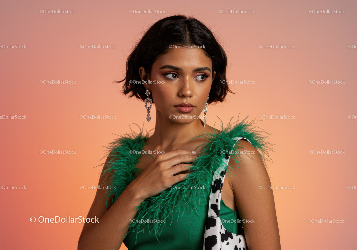 Fashion Portrait of a Young Woman Wearing a Green Feathered Top