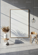 Minimalist Interior with Blank Frame and Natural Light