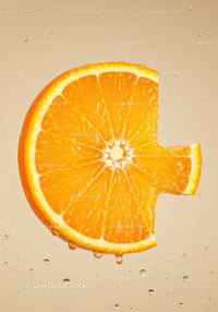 Fresh Orange Slice with Dripping Juice in Water