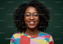 Portrait of a Smiling Woman with Curly Hair Wearing Colorful Top