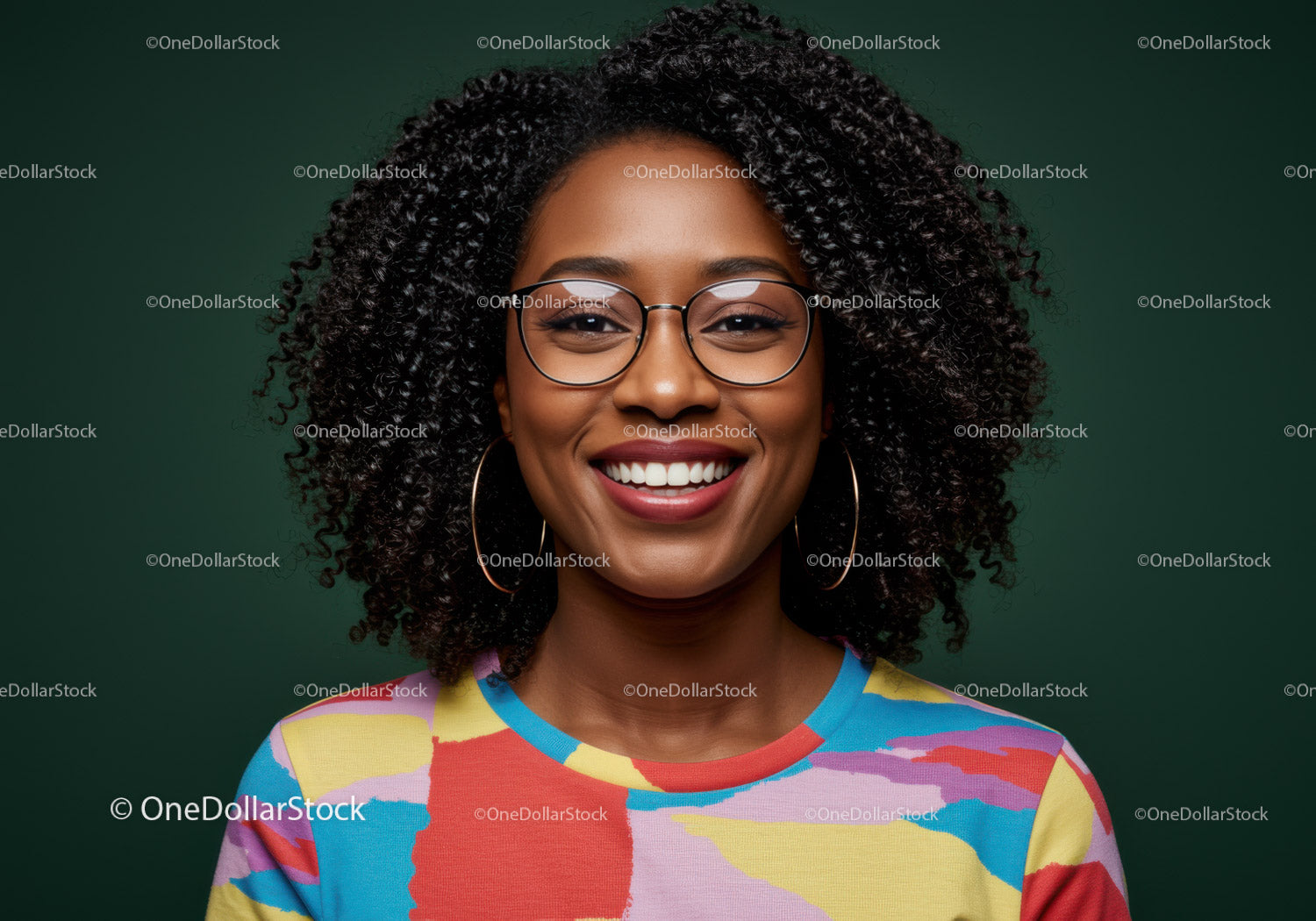 Portrait of a Smiling Woman with Curly Hair Wearing Colorful Top