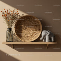 Minimalist shelf with dried flowers woven basket and elephant toy