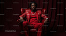 Confident Man in a Bold Red Suit Sitting Elegantly