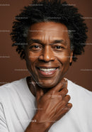 Close-up of Happy Mature Man with Curly Hair and Warm Smile