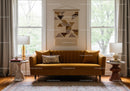Cozy living room with mustard sofa and natural light