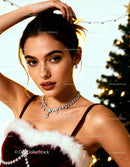 Young woman in festive dress with sparkling jewelry
