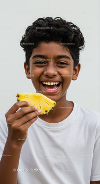 Young Boy Enjoying Pineapple with a Bright Smile in Summer