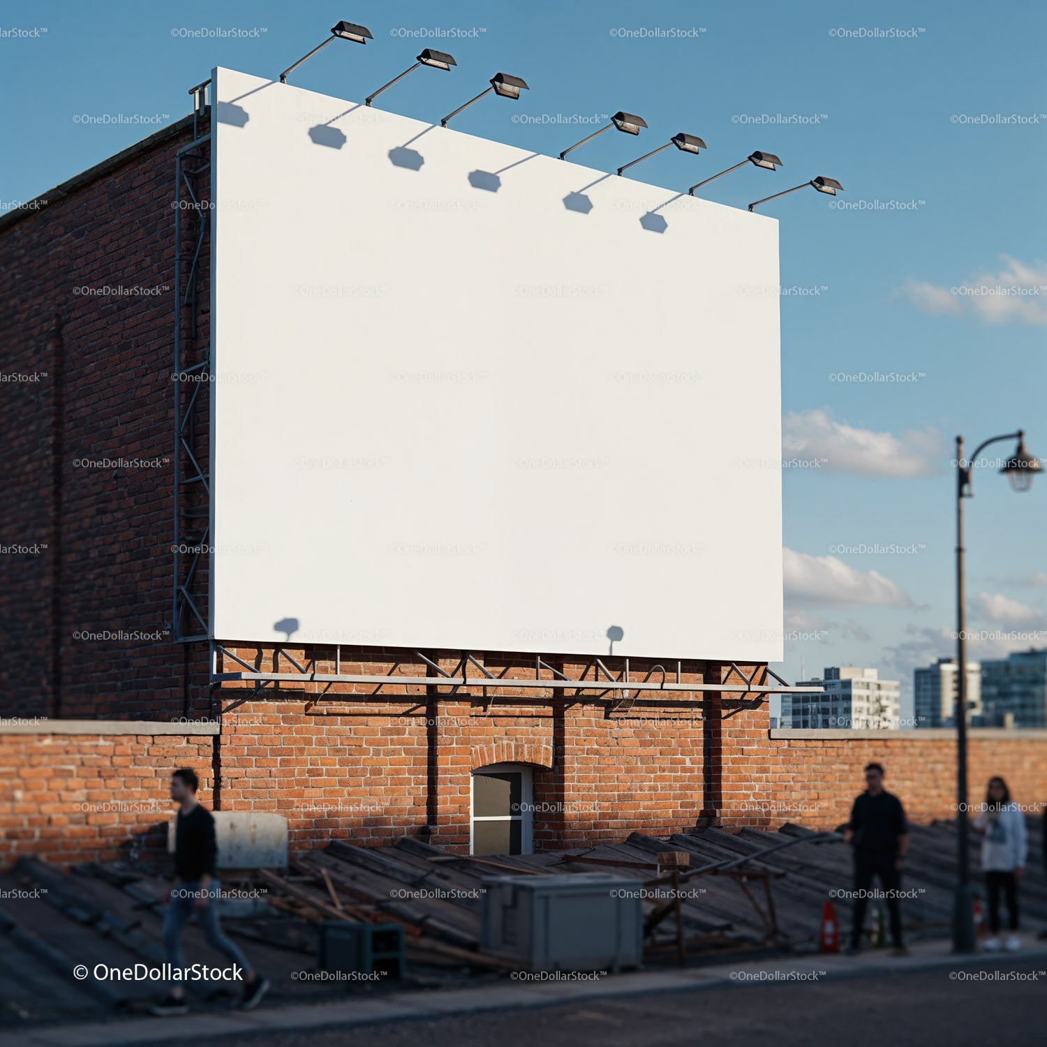Empty urban billboard mounted on brick wall
