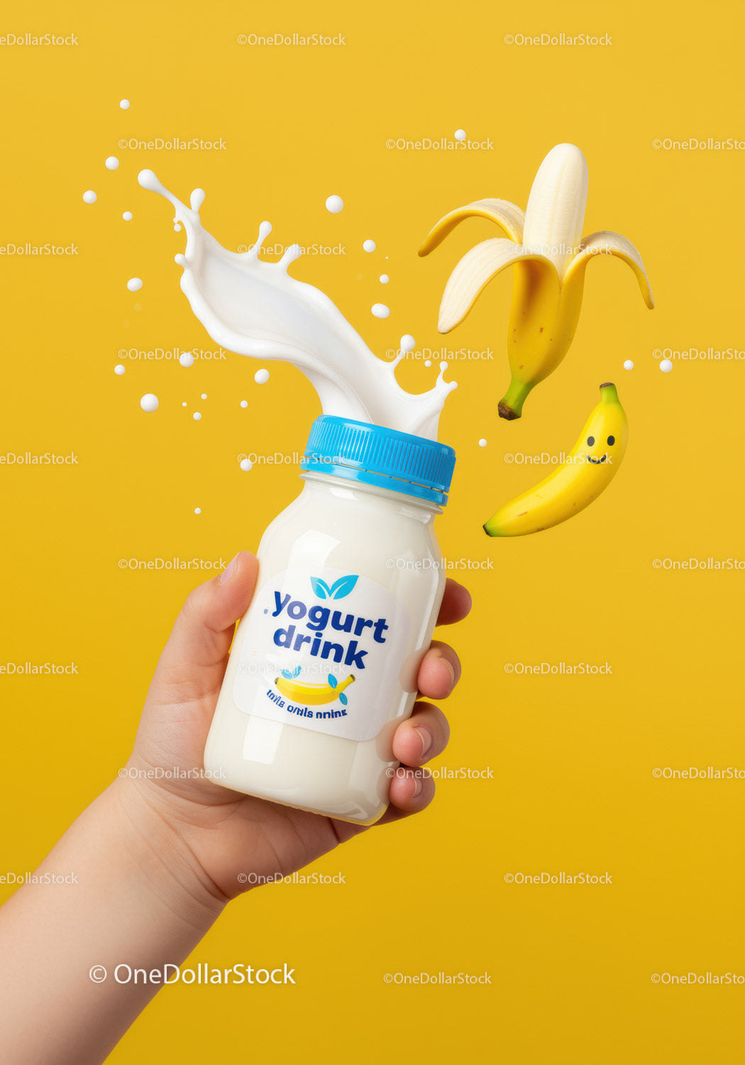 Child holding yogurt drink with banana splash and smile