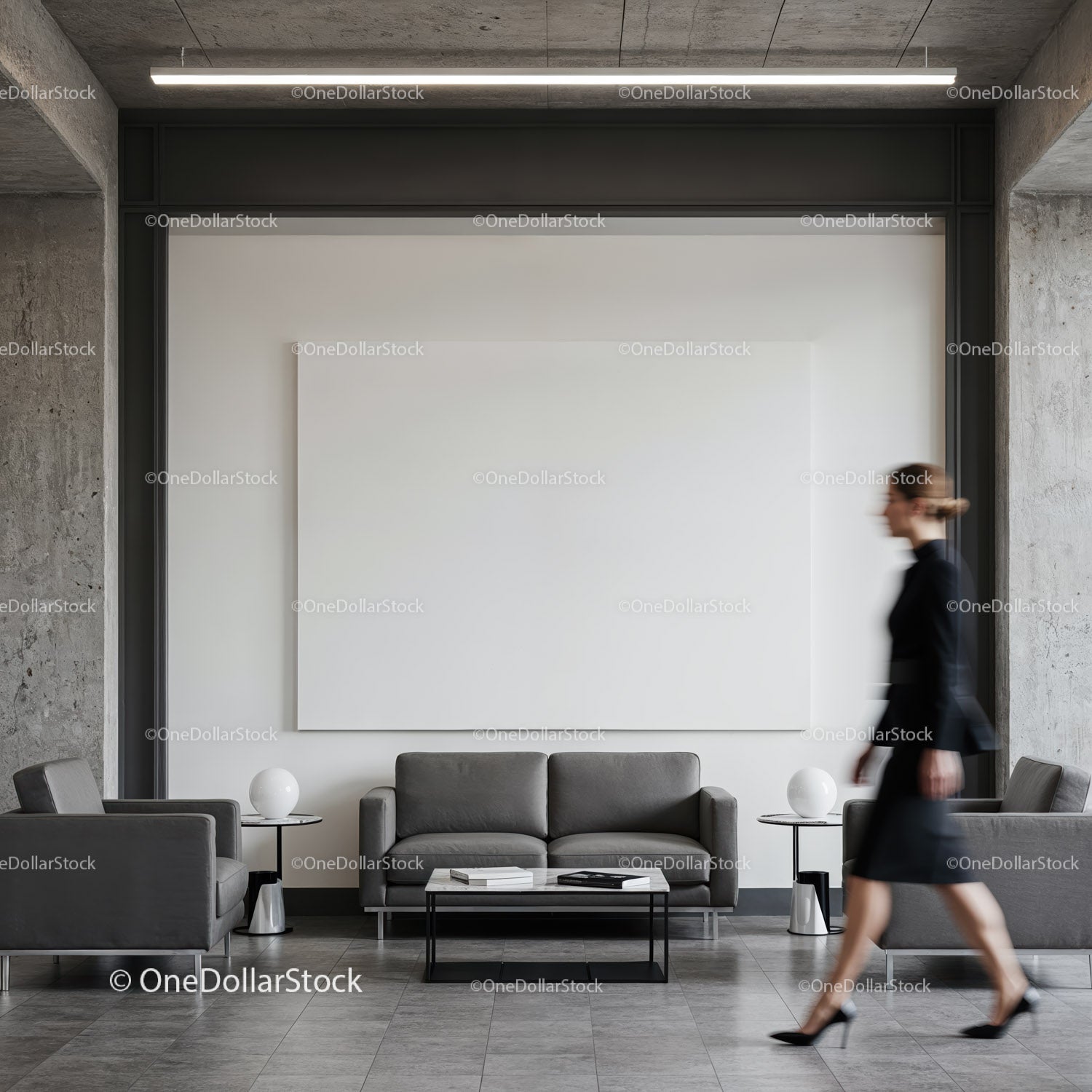 Nowoczesne lobby biurowe z minimalistycznymi, szarymi meblami