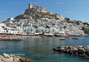 Charming Mediterranean Coastal Village with White Houses and Boats