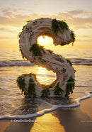 Driftwood Letter S Decorated with Seaweed on Beach Sunset