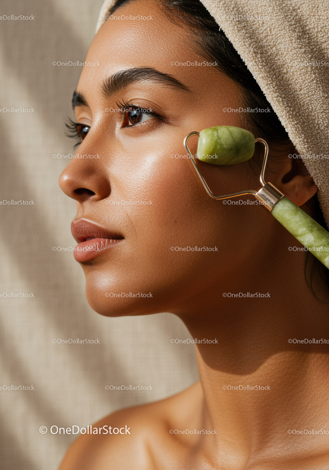 Young Woman Using Jade Roller for Facial Massage and Skin Wellness