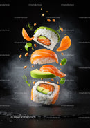 Fresh sushi rolls with salmon and avocado floating