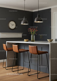 Modern Kitchen with Dark Cabinets and Seating Area