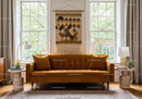 Modern cozy living room with mustard velvet sofa