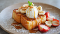 Sweet Banana French Toast with Strawberries and Caramel Drizzle