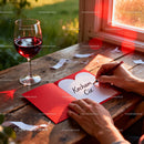 Writing a Heartfelt Love Note with Red Wine Nearby