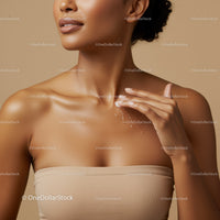 Elegant Woman Applying Moisturizer for Glowing Skin
