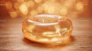 Luxurious Golden Glass Gemstone with Sparkling Glitter in Sunlight