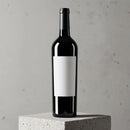 Classic Red Wine Bottle with Blank Label on Concrete Pedestal