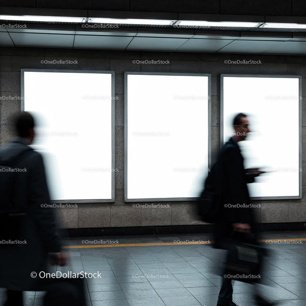 Blurred commuters walking past empty advertising boards JPG Mockup Image