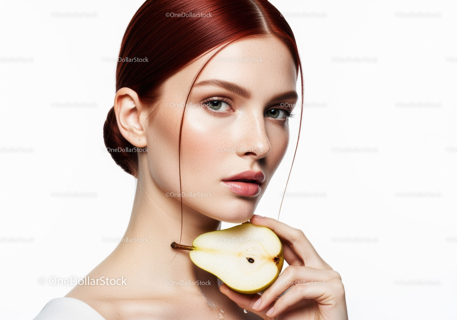 Elegant Woman with Red Hair Holding Pear Against White Background