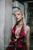 Glamorous Woman Wearing Elegant Jewelry and Red Dress