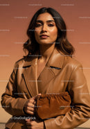 Stylish Woman in Leather Jacket Holding Brown Suede Clutch Outdoor Portrait