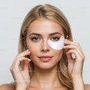 Elegant Woman Applying Facial Mask for Skincare Routine