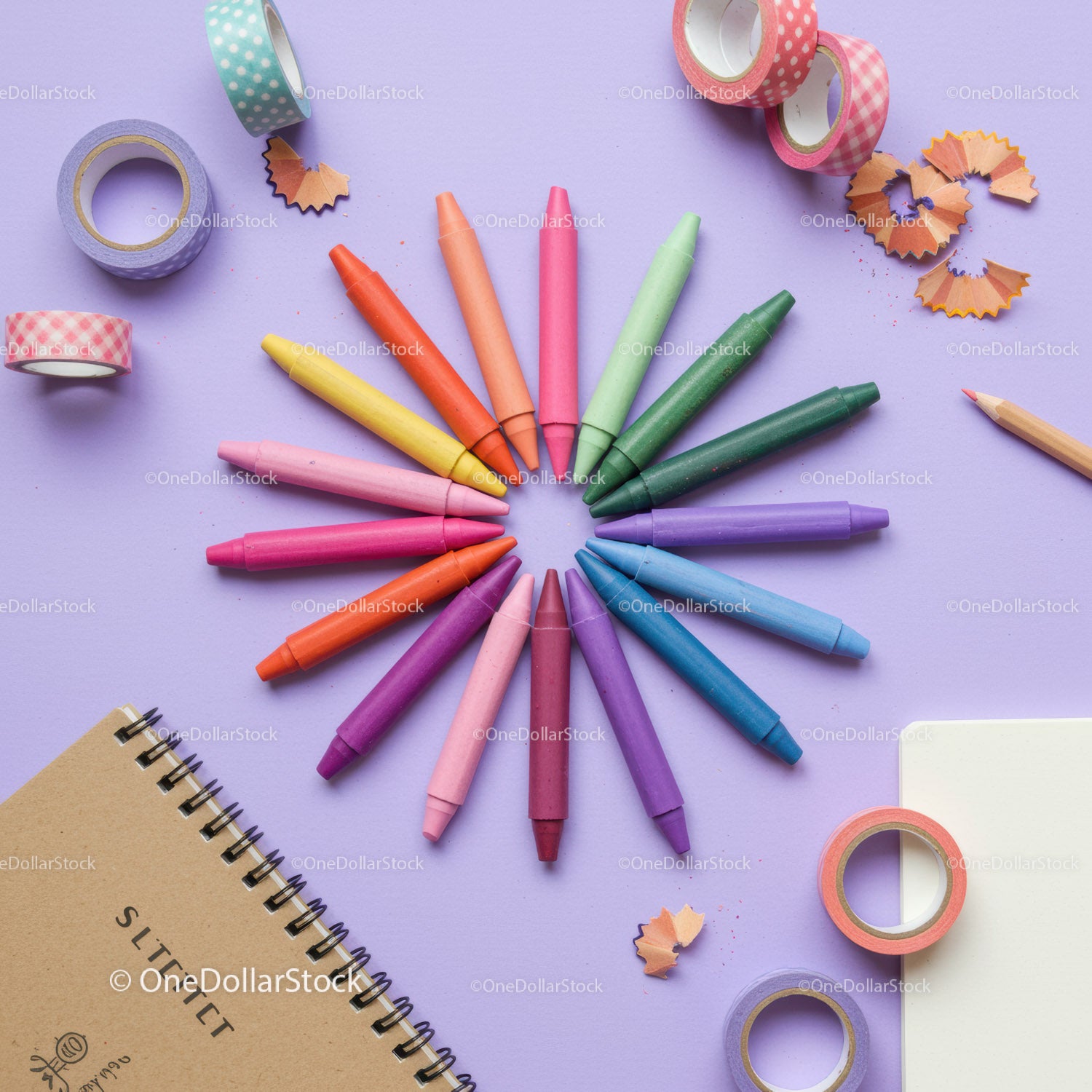 Colorful crayons arranged in a creative circle on desk