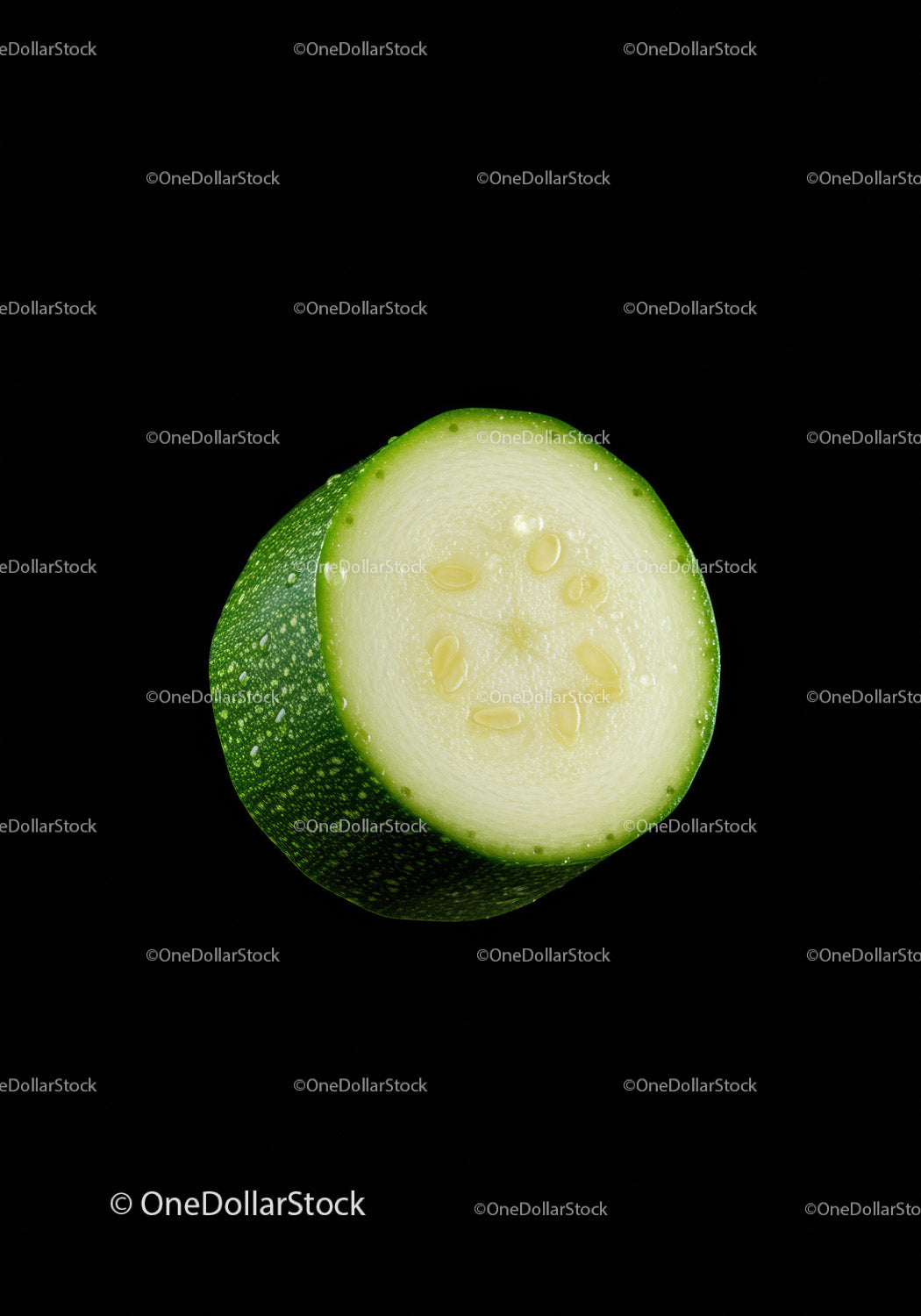 Fresh green zucchini slice with water droplets