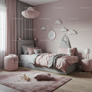 Cozy Children's Bedroom with Pink and Gray Decor and Cloud Wall Art