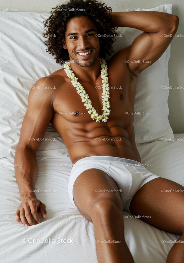 Smiling man relaxing on bed with flower necklace