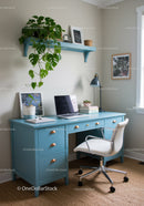 Bright and Stylish Home Office with Blue Desk and Green Plants