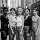 Diverse Women Standing Confidently in Urban Setting
