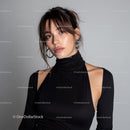 Elegant Young Woman in Black Style Top with Confident Expression