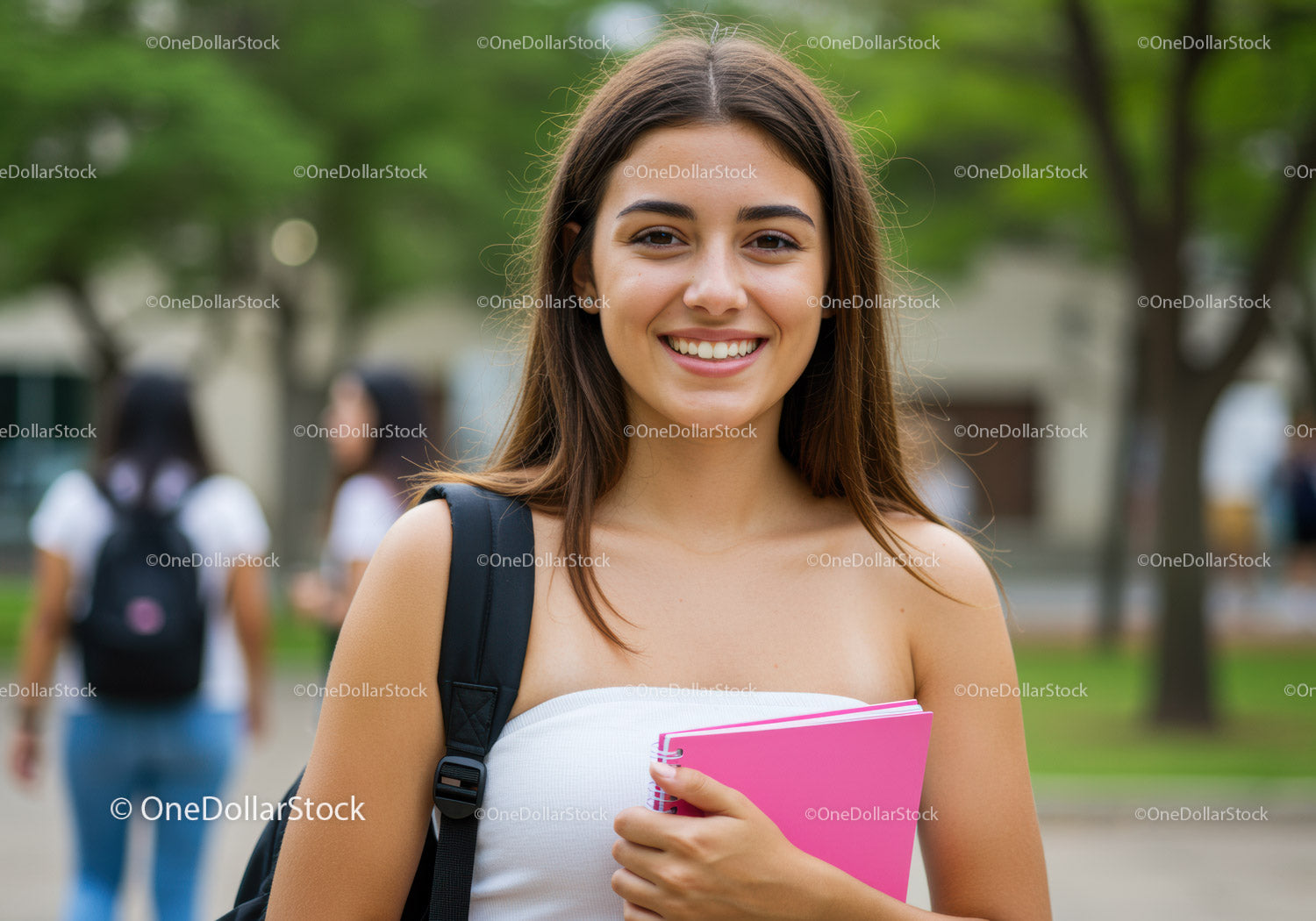 Young Smiling Woman with Pink Notebook Outdoors on Campus