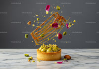 Elegant Pistachio Tart with Caramel and Floral Decoration